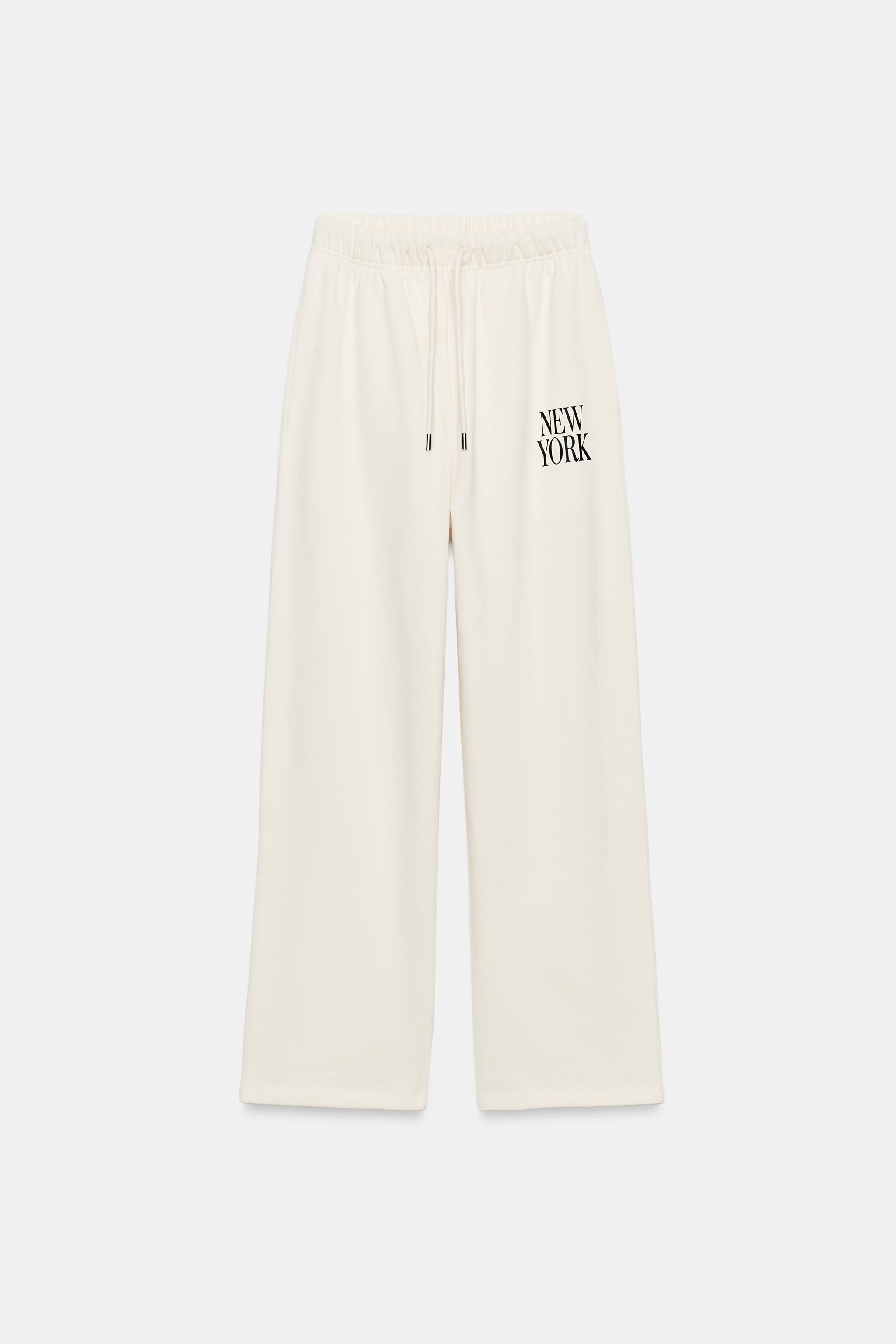 TEXT WIDE-LEG TROUSERS